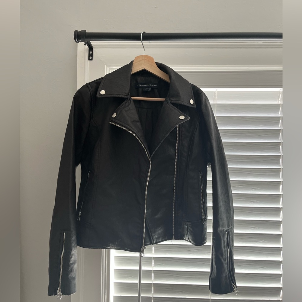 Black moto jacket. Worn once !